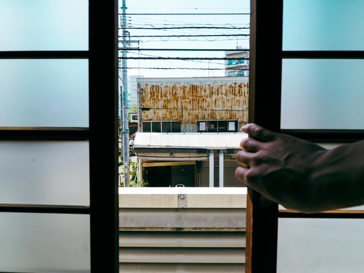 まちの別邸 緝 Shu Hostel Kōchi Buitenkant foto
